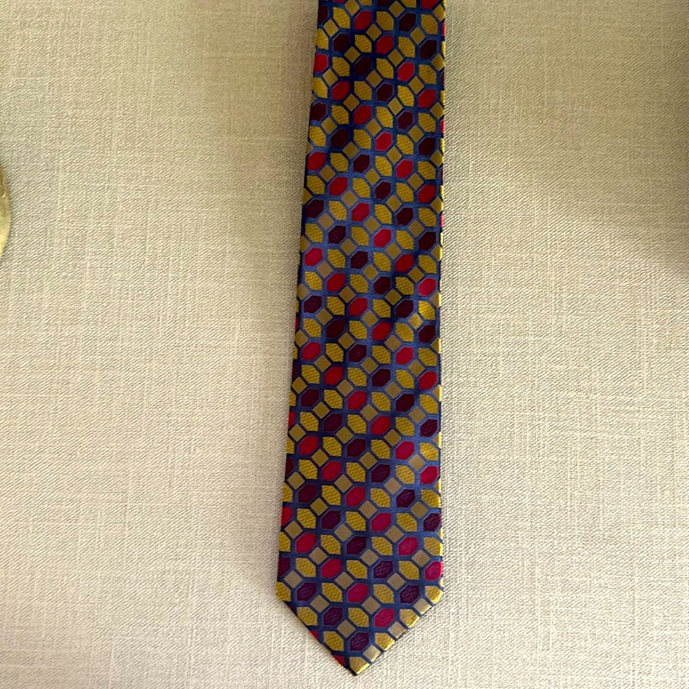 XMI silk tie.  Jewel tones-gold, blue, magenta and purple